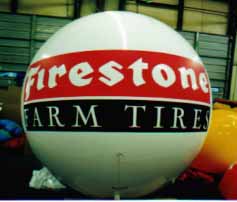 Helium Balloon with Firestone logo. Big balloons provide inexpensive exposure.